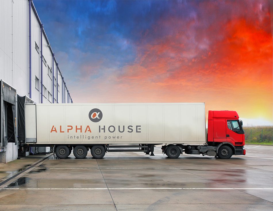 Alpha House lorry unloading at sunset